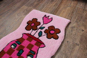 (NOW 30% OFF) was £120! Checkerboard pink and orange plant pot tufted rug